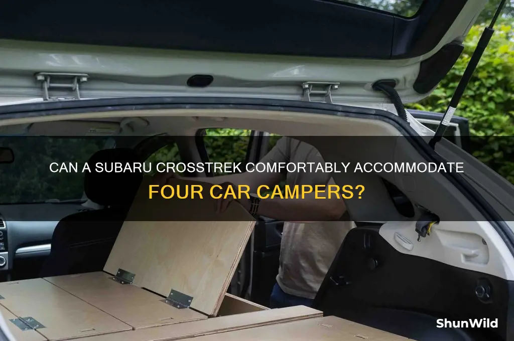 can four people car camp from subaru cross trek