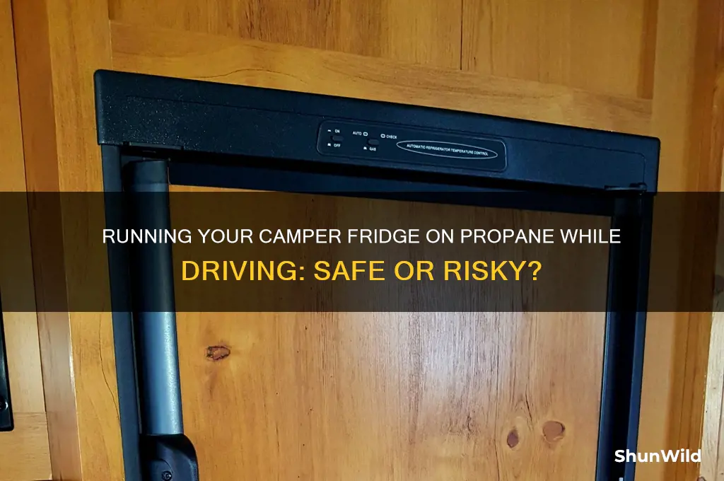 can i run my camper fridge on propane while driving