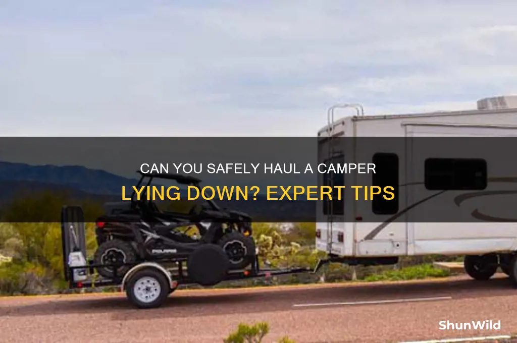 can l haul a camper laying down