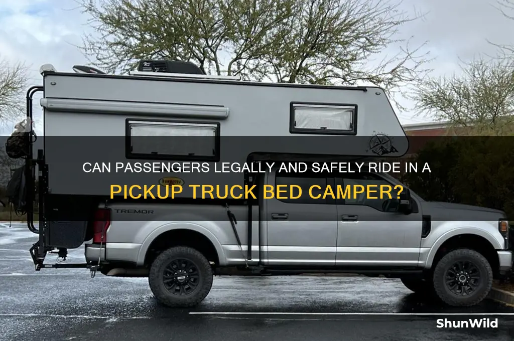 can passengers ride in pickup truck bed camper