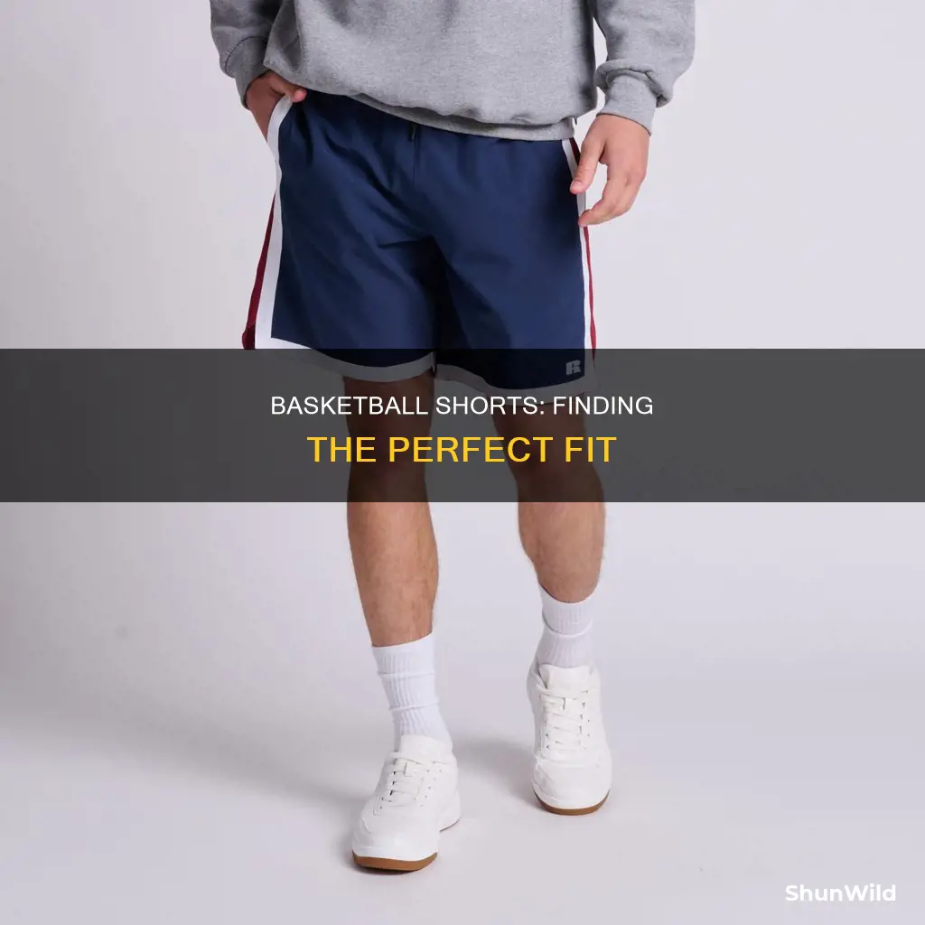 how are basketball shorts supposed to fit