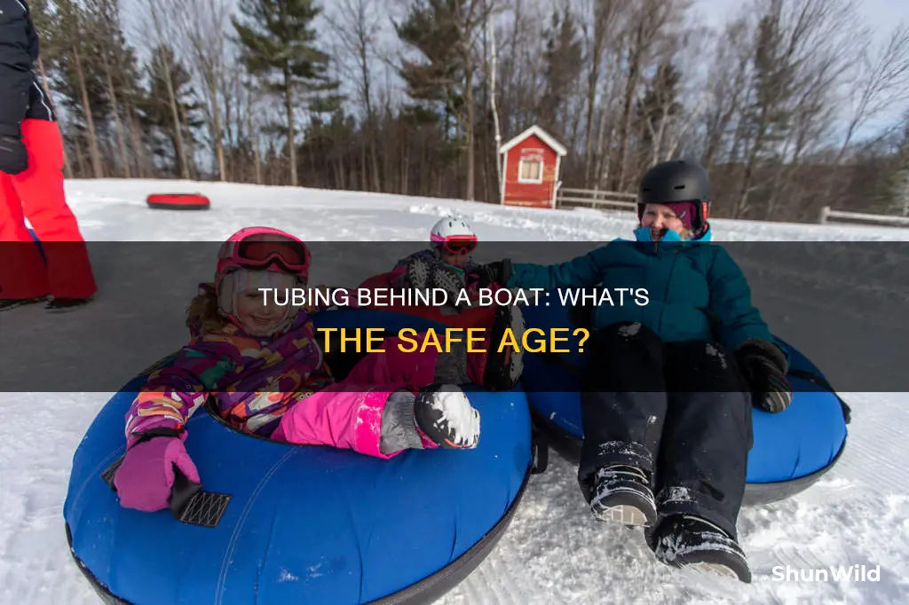 how old to go tubing behind a boat