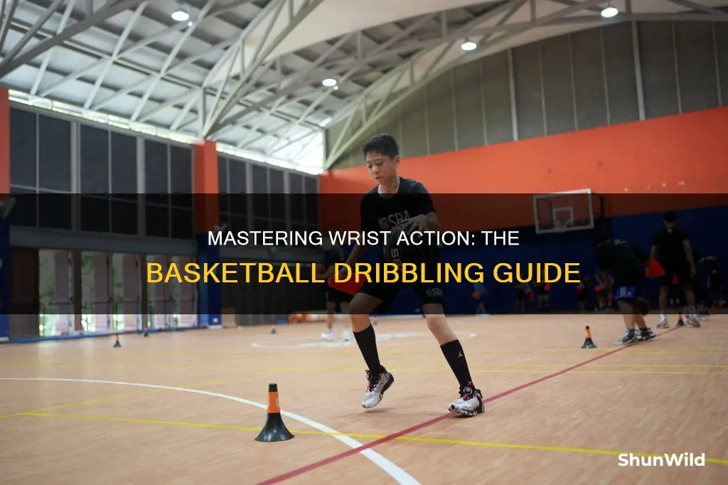 how should your wrist be when dribbling basketball