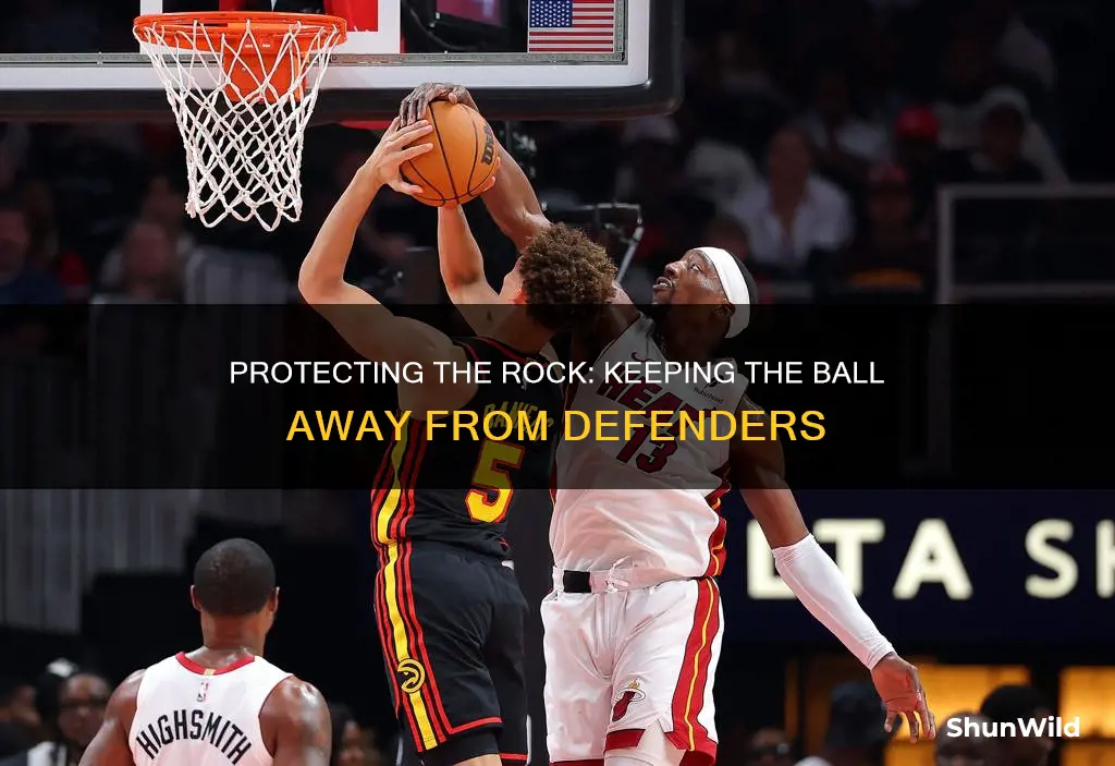 how to keep basketball away from defender when dribbling