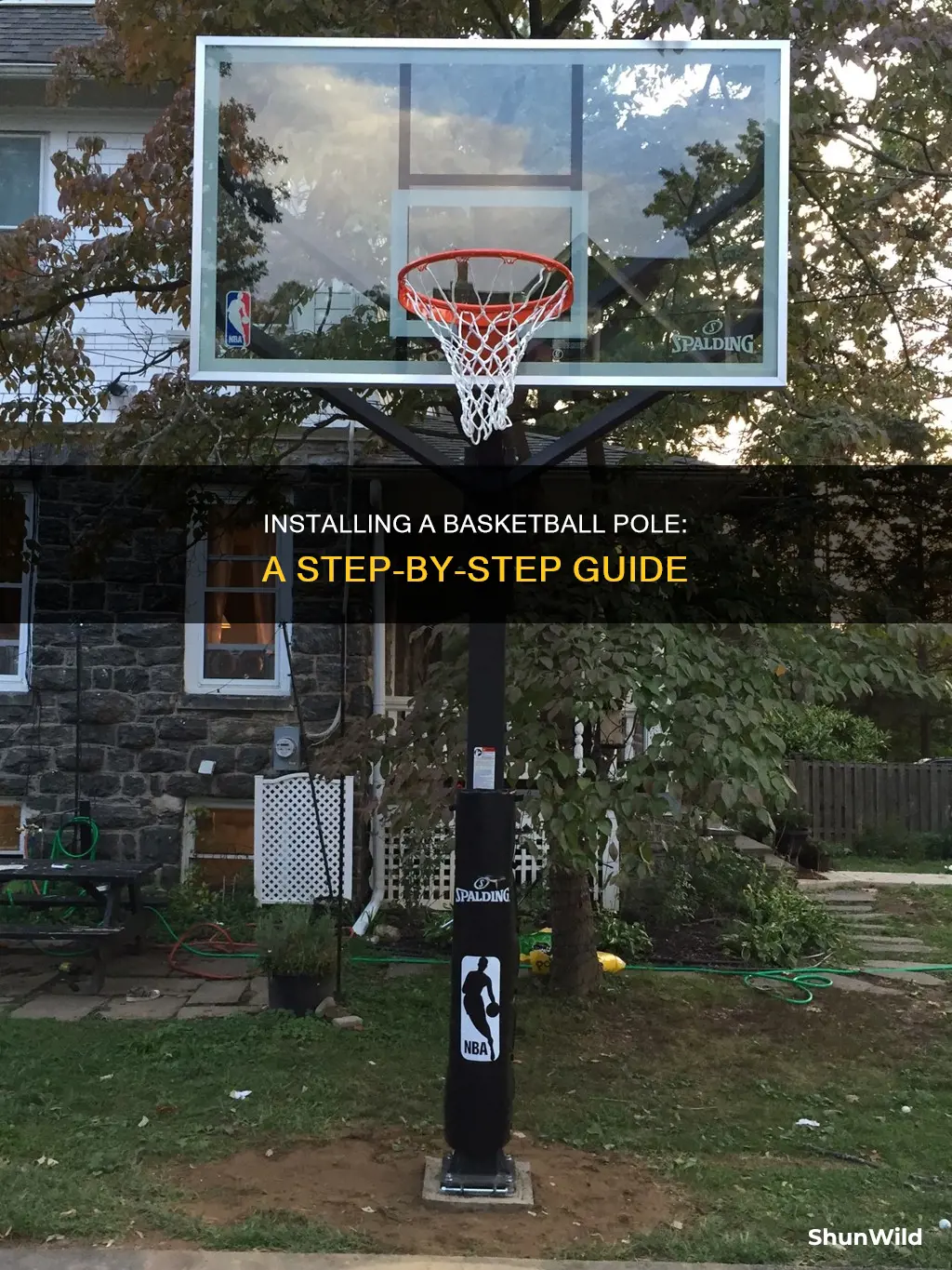how to put a basketball pole in the ground