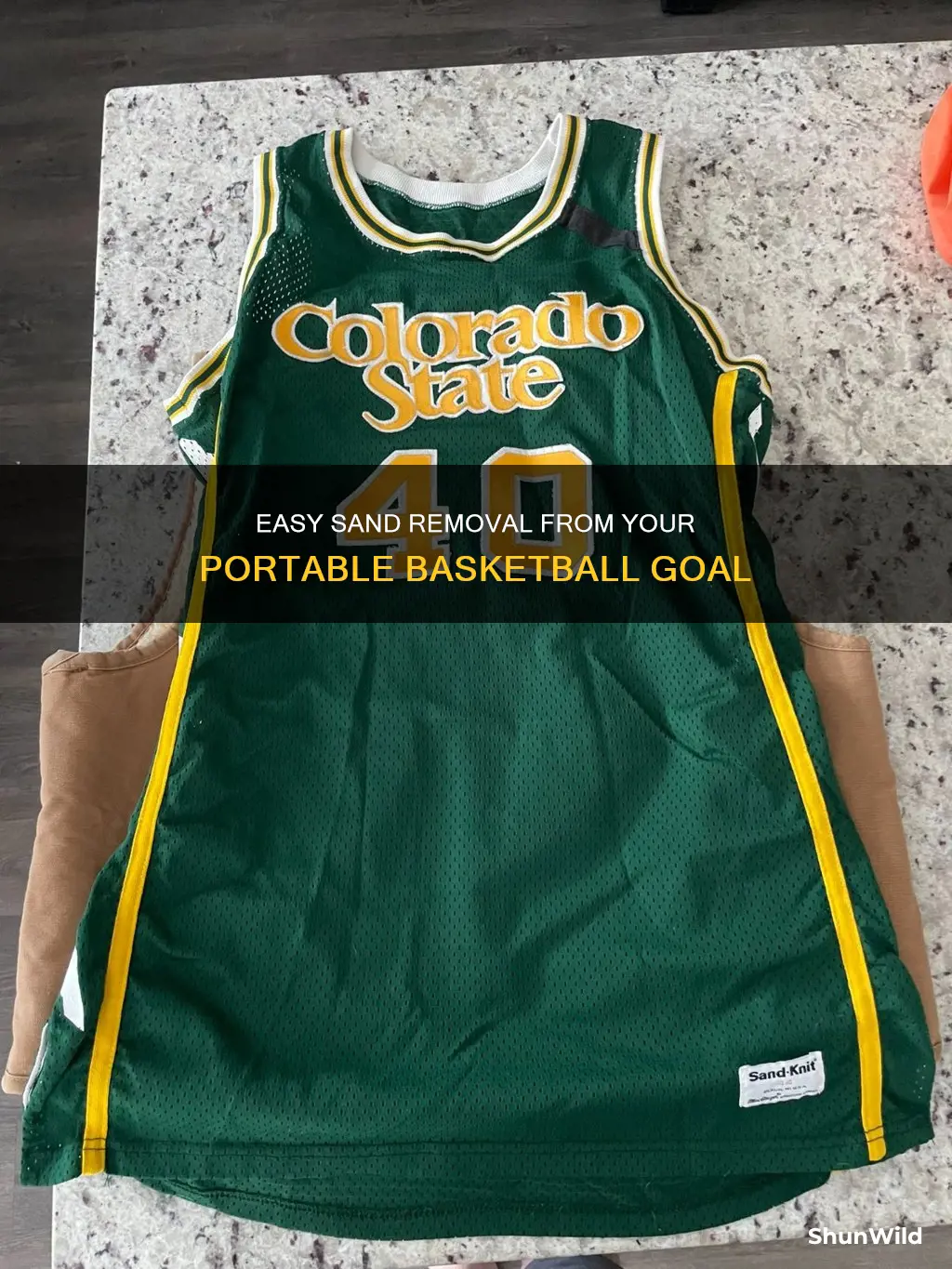 how to remove sand from portable basketball goal