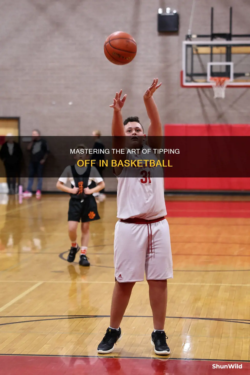 how to throw a basketball up for a tip offf