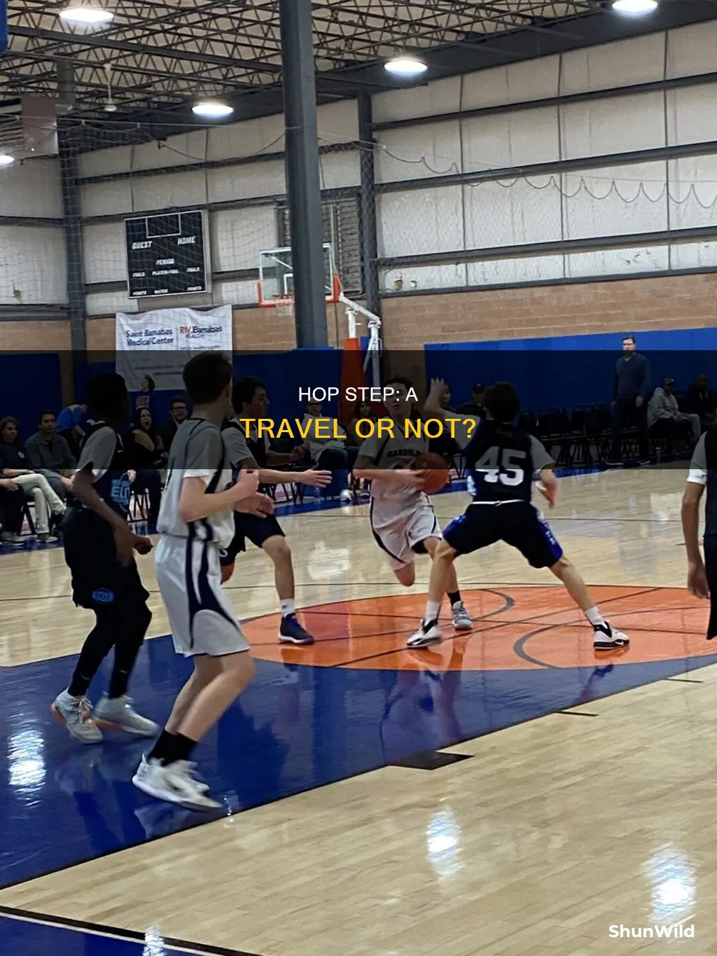 is hop step a travel in basketball
