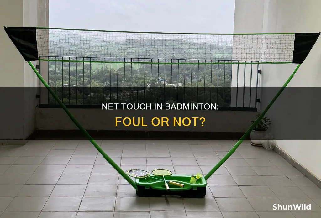is touching the net a foul in badminton
