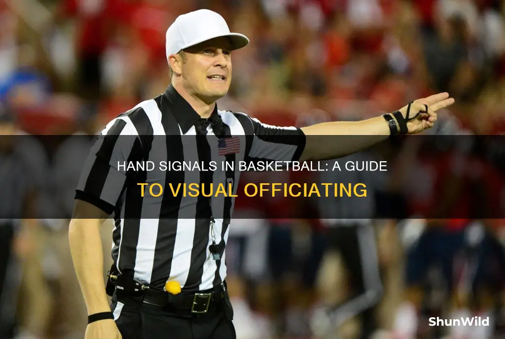 what are the different hand signals in officiating basketball