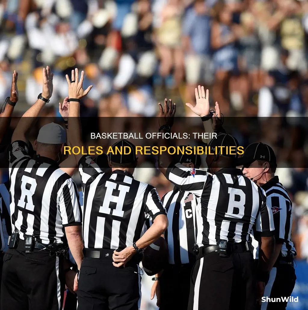what are the officials in basketball and their duties
