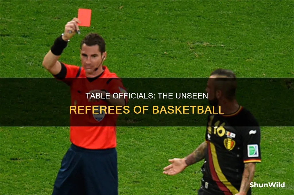 what do table officials do in basketball
