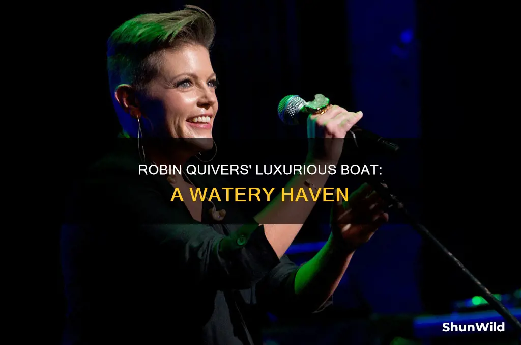 what kind of boat does robin quivers have