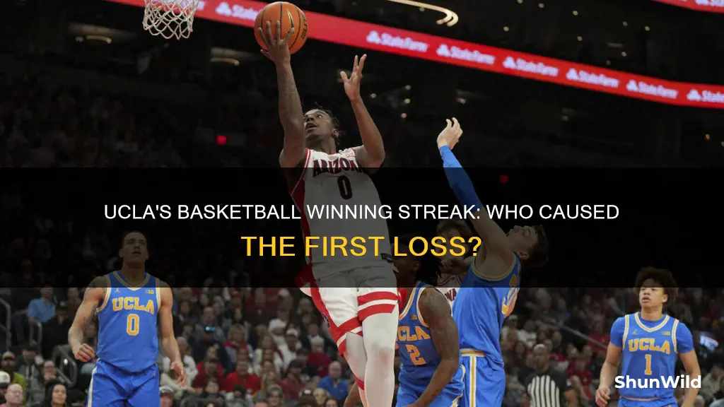 who broke ucla basketball winning streak