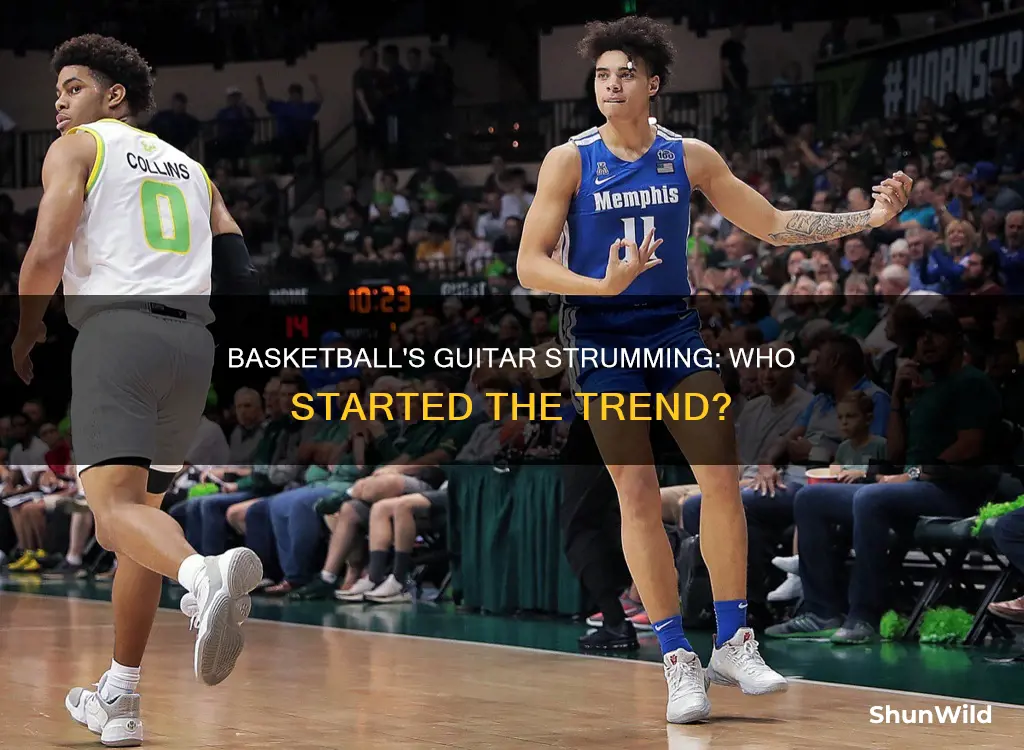 who started the strumming the guitar in basketball