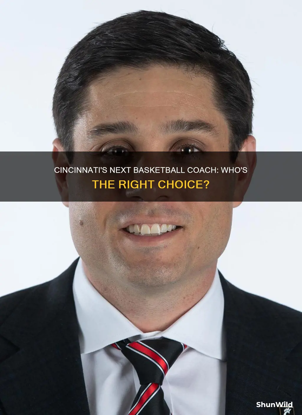 who will cincinnati hire as basketball coa h