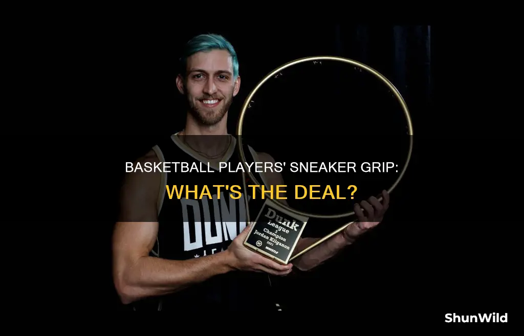 why do basketball players grab their shoes